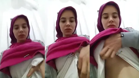 Türbanlı bakire tişörtünün altından memelerini gösteriyor