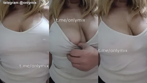 Büyük memelerini derin dekolte ile sergiliyor