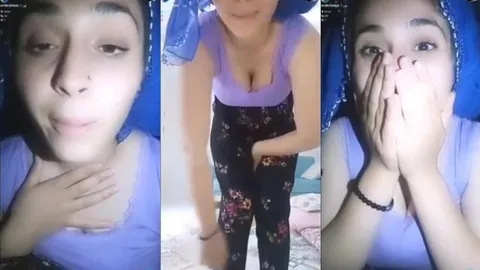 Türbanlı kürt karı yayında eğiliyor ve meme dekoltesi veriyor